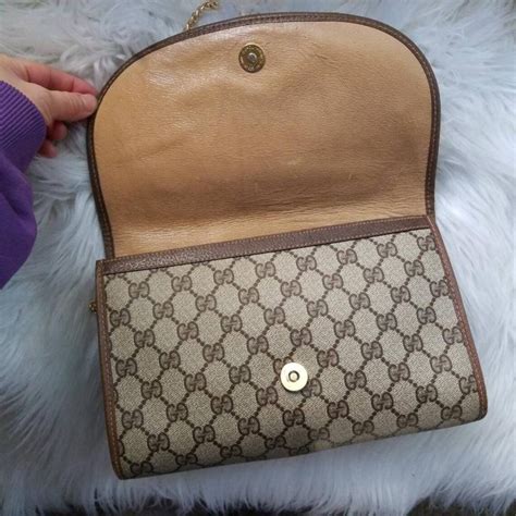 authentic vintage gucci clutch.